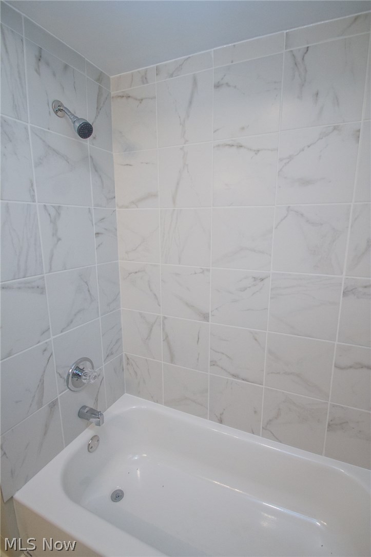 10571 Snow Road Parma Heights, OH 44130 - Photo 16 of 25 Full bath tub and shower