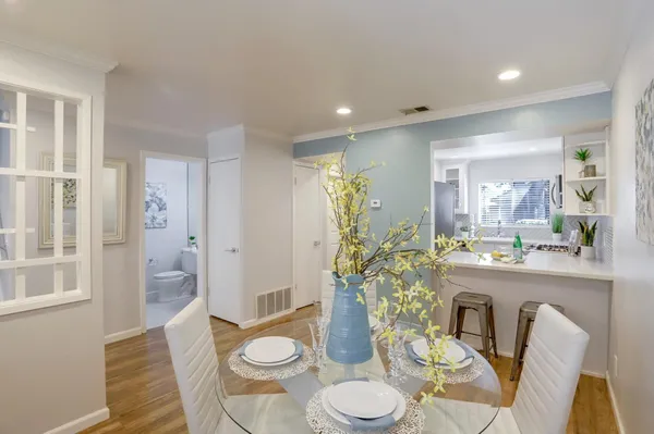 a living room with furniture and a table