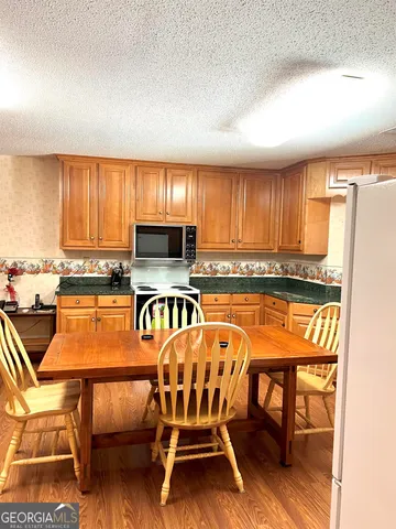 a bathroom with a sink and a shower