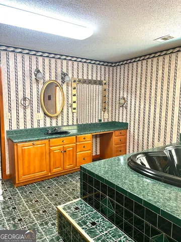 a view of a tree in front of a house with a tree