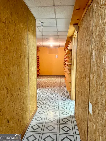 a view of bench sitting in middle of yard