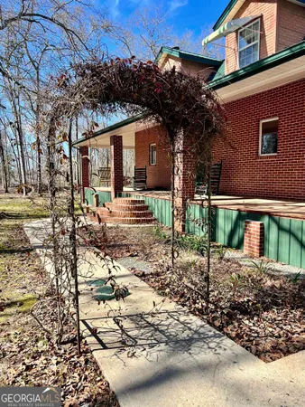 a view of a porch with a yard