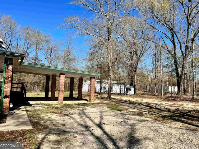swimming pool view with a outdoor seating