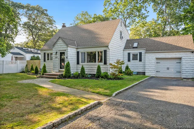 front view of a house and a yard