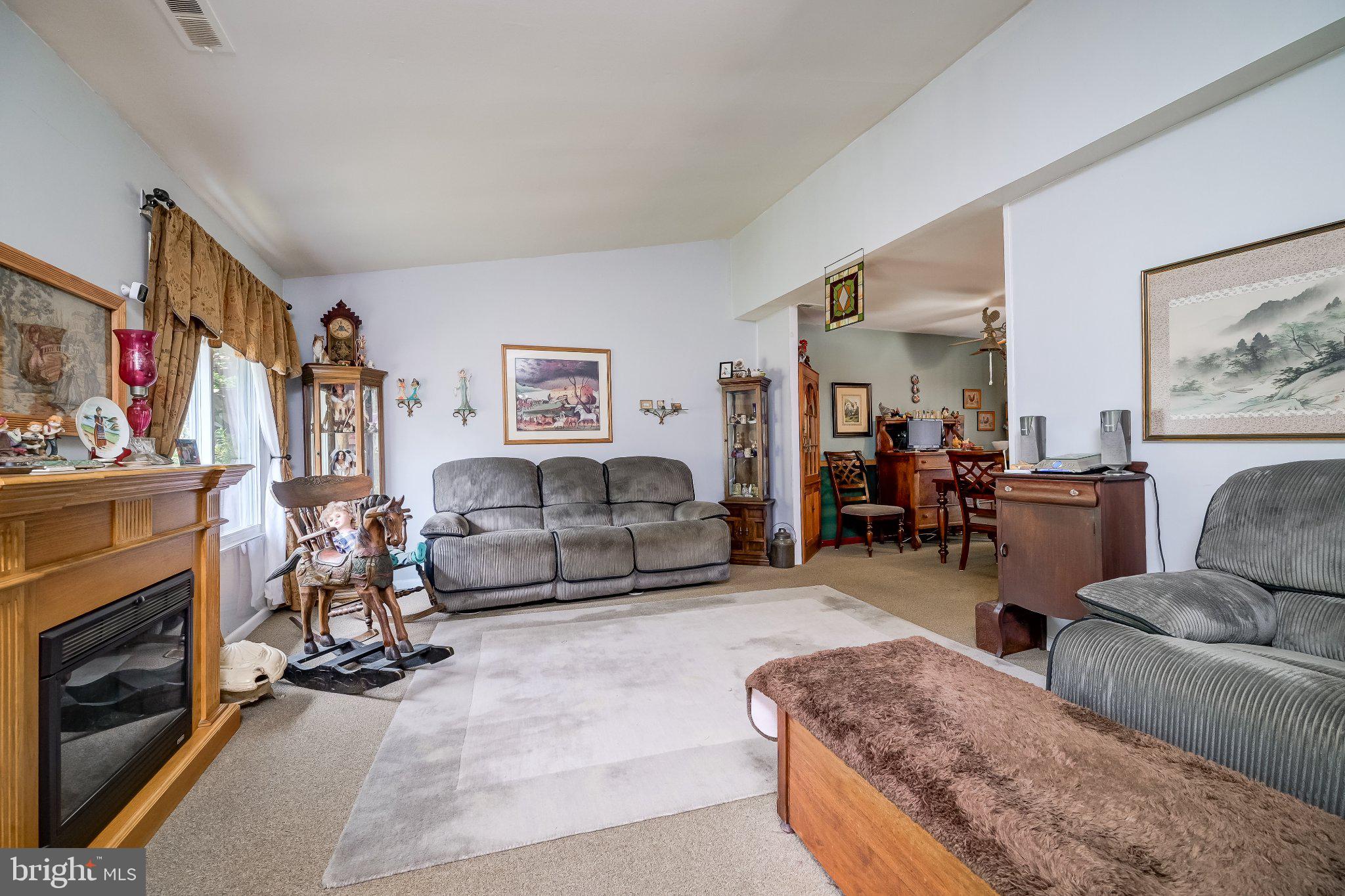 11 Aquarius Court Silver Spring, MD 20906 - Photo 11 of 49 Cozy living space with warm accents.