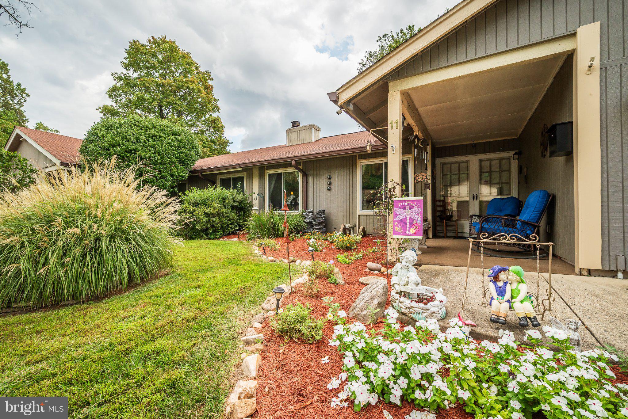 11 Aquarius Court Silver Spring, MD 20906 - Photo 2 of 49 Charming home with vibrant garden.