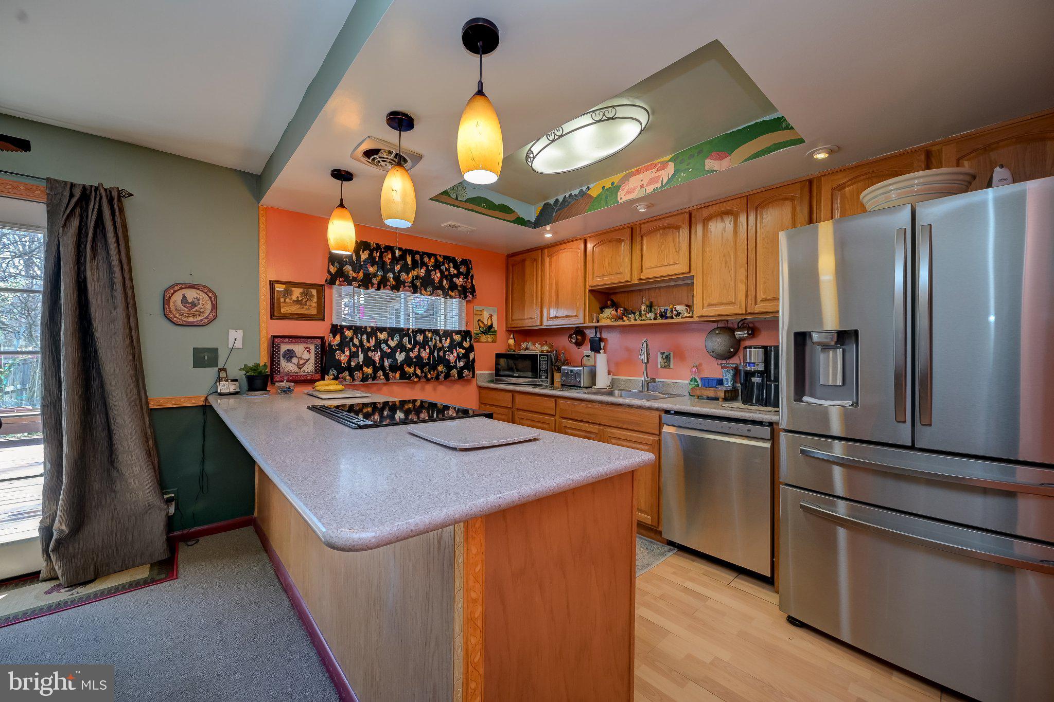 11 Aquarius Court Silver Spring, MD 20906 - Photo 22 of 49 Charming kitchen with vibrant accents.