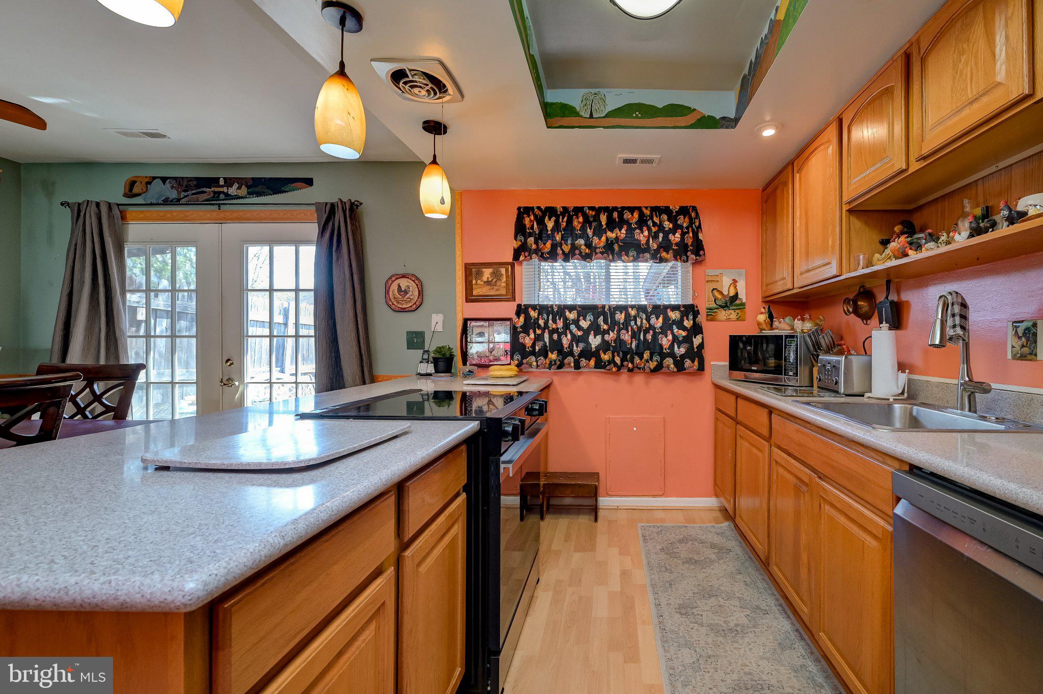 11 Aquarius Court Silver Spring, MD 20906 - Photo 23 of 49 Charming kitchen with vibrant accents.
