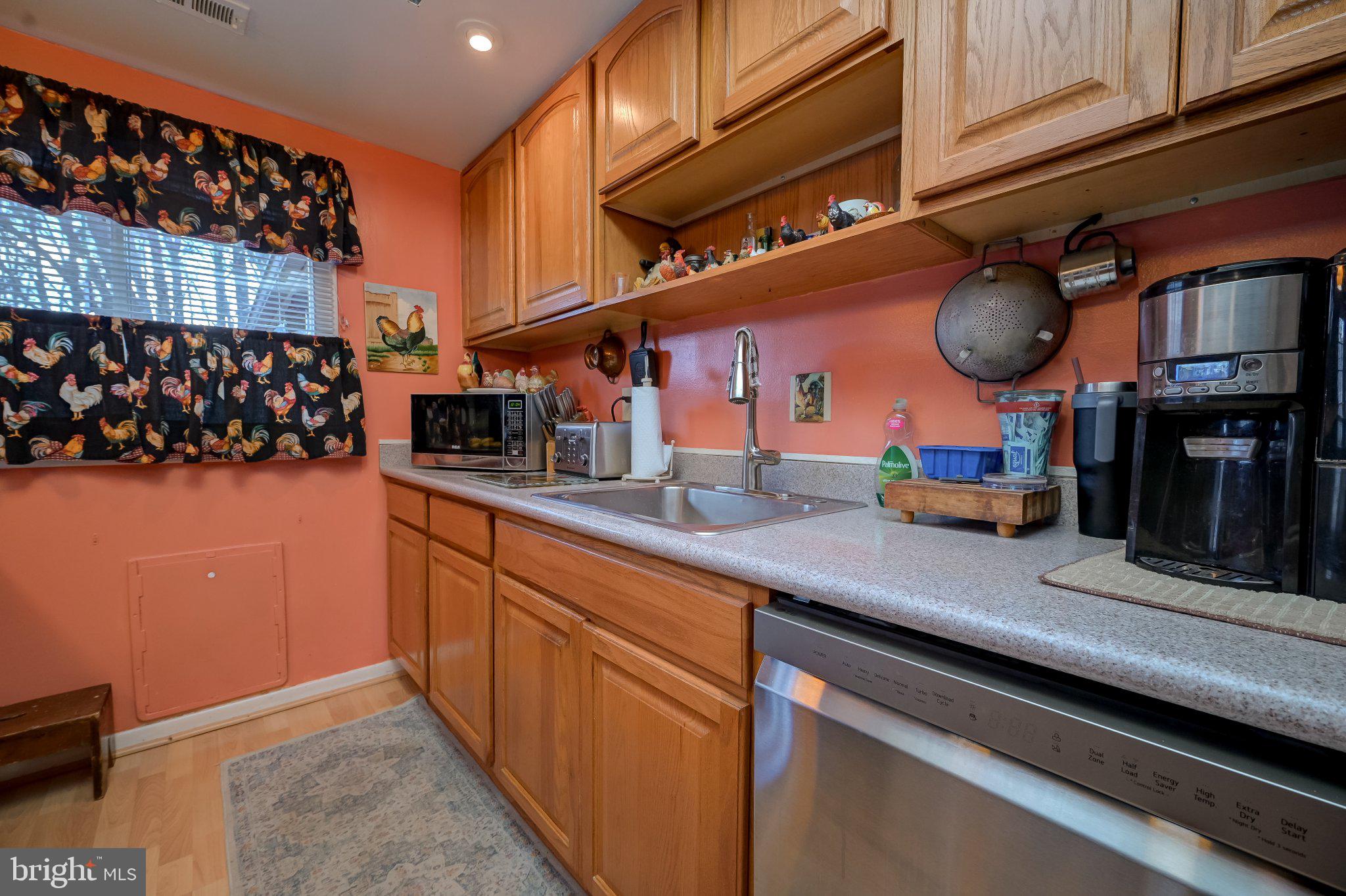11 Aquarius Court Silver Spring, MD 20906 - Photo 25 of 49 Charming kitchen with warm hues.