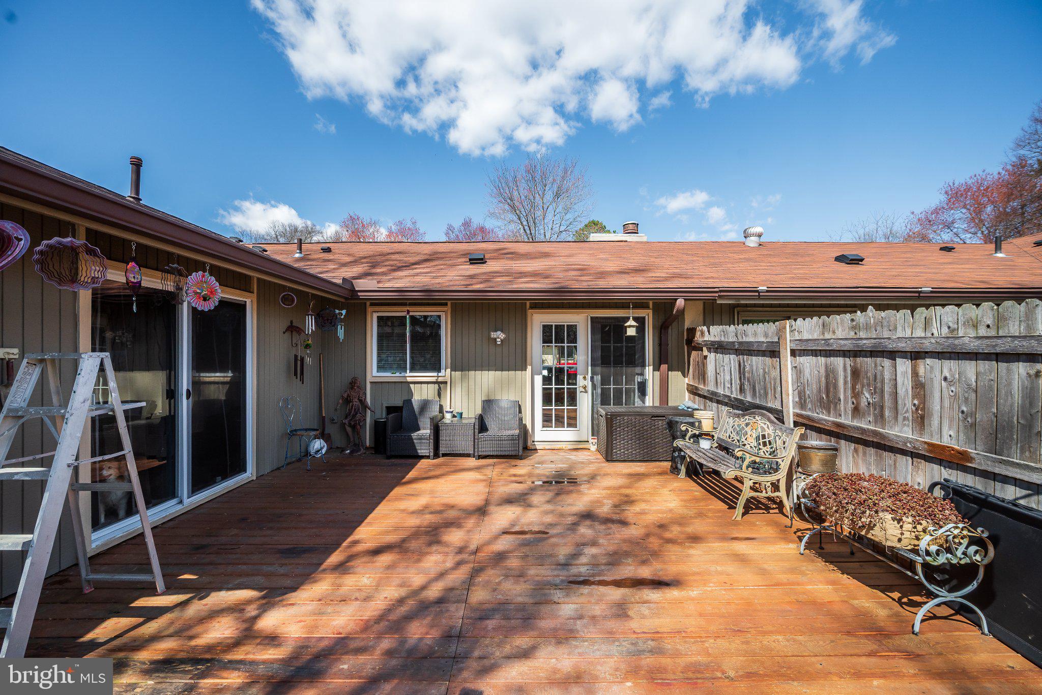 11 Aquarius Court Silver Spring, MD 20906 - Photo 30 of 49 Sunny patio retreat with wooden deck.