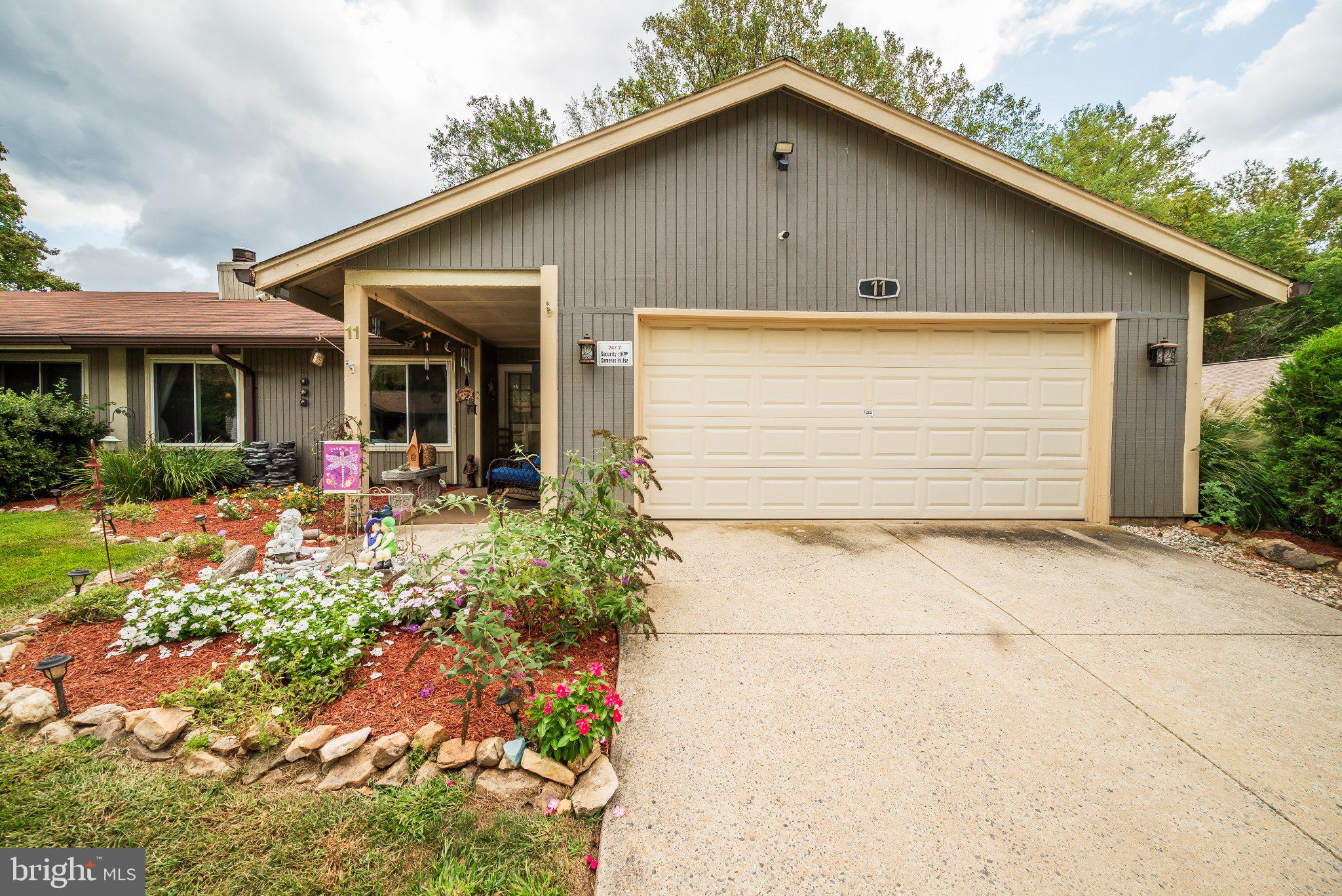 11 Aquarius Court Silver Spring, MD 20906 - Photo 3 of 49 Charming home with vibrant landscaping.