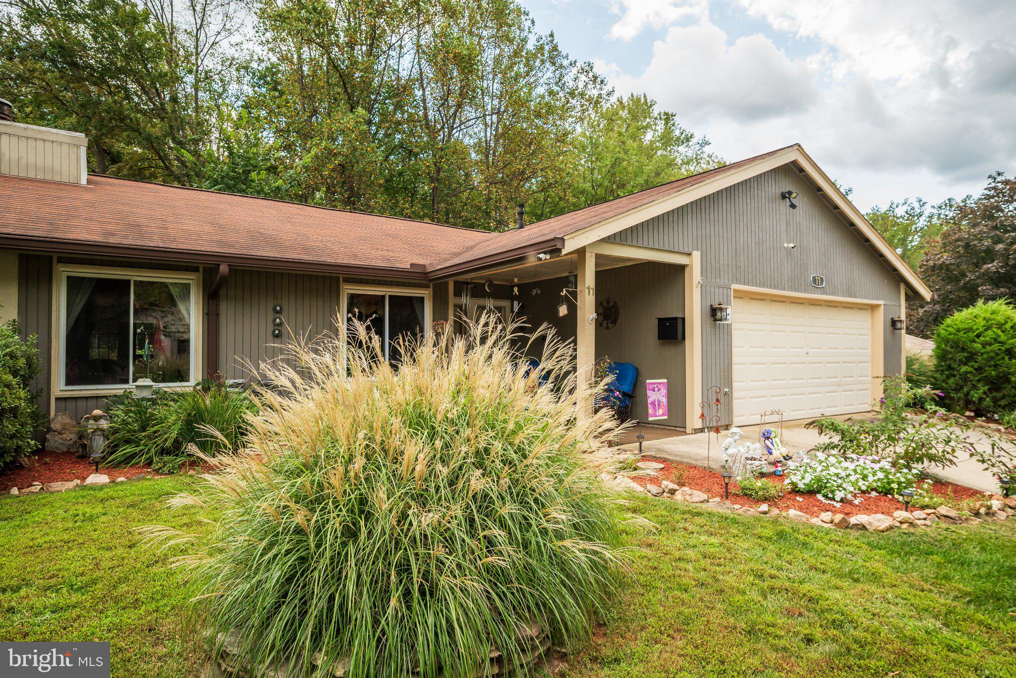 11 Aquarius Court Silver Spring, MD 20906 - Photo 4 of 49 Charming home with lush landscaping.