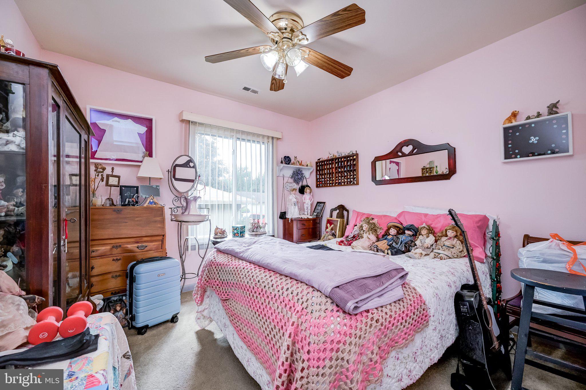 11 Aquarius Court Silver Spring, MD 20906 - Photo 46 of 49 Charming pink-hued bedroom retreat.