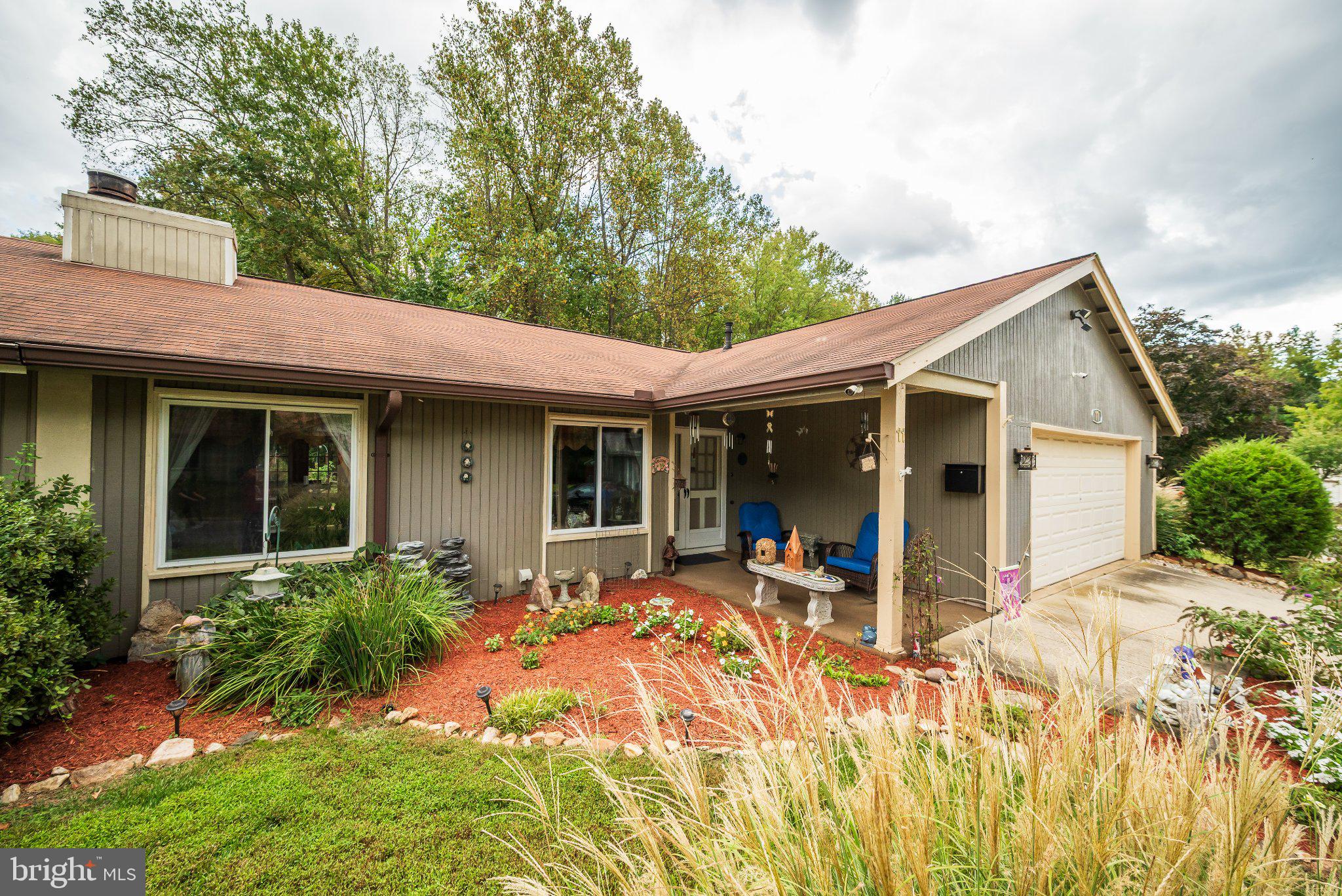 11 Aquarius Court Silver Spring, MD 20906 - Photo 6 of 49 Charming home with lush landscaping.