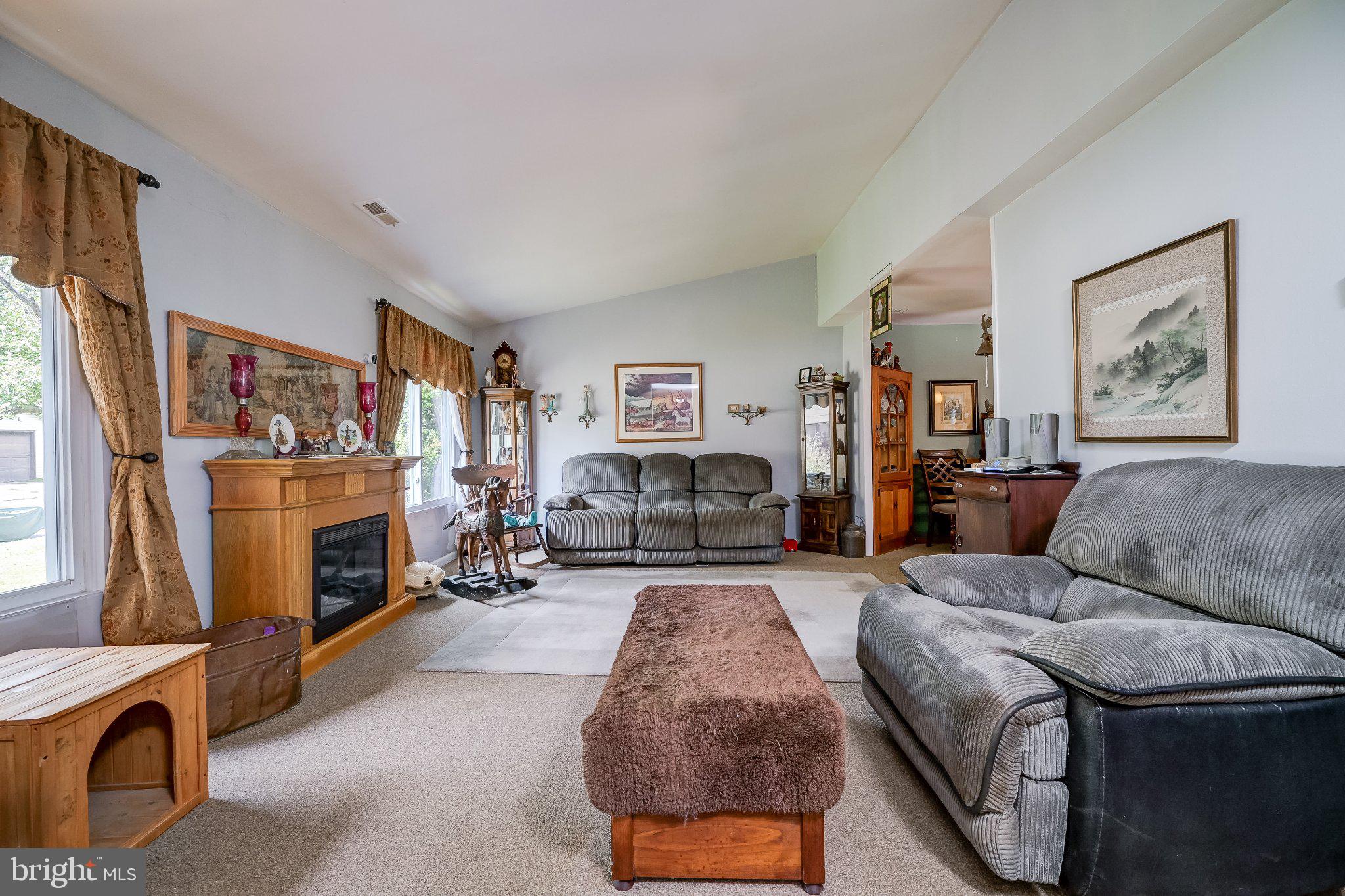 11 Aquarius Court Silver Spring, MD 20906 - Photo 10 of 49 Spacious living area with cozy charm.