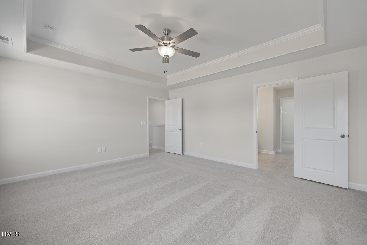 233 Tenure Lane Lillington, NC 27546 - Photo 18 of 30 an empty room with a bathroom