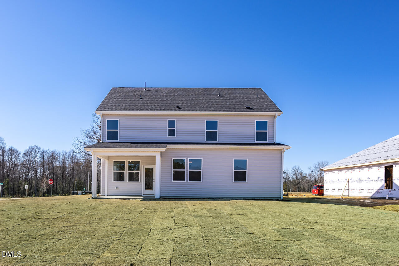 233 Tenure Lane Lillington, NC 27546 - Photo 29 of 30 a front view of a house with a yard