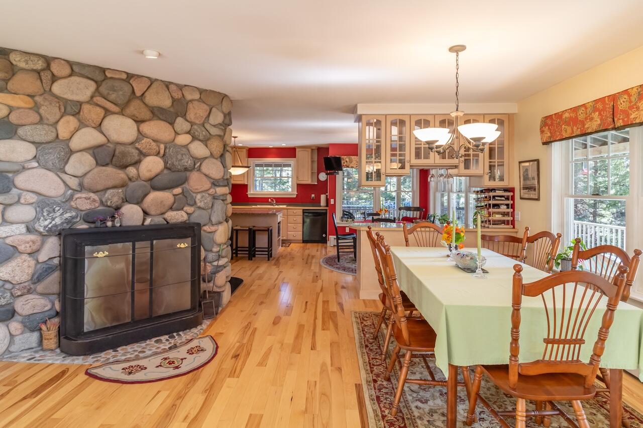 177 Richtown Road Bernard, ME 04612 - Photo 17 of 59 Stone fireplace & Dining Room