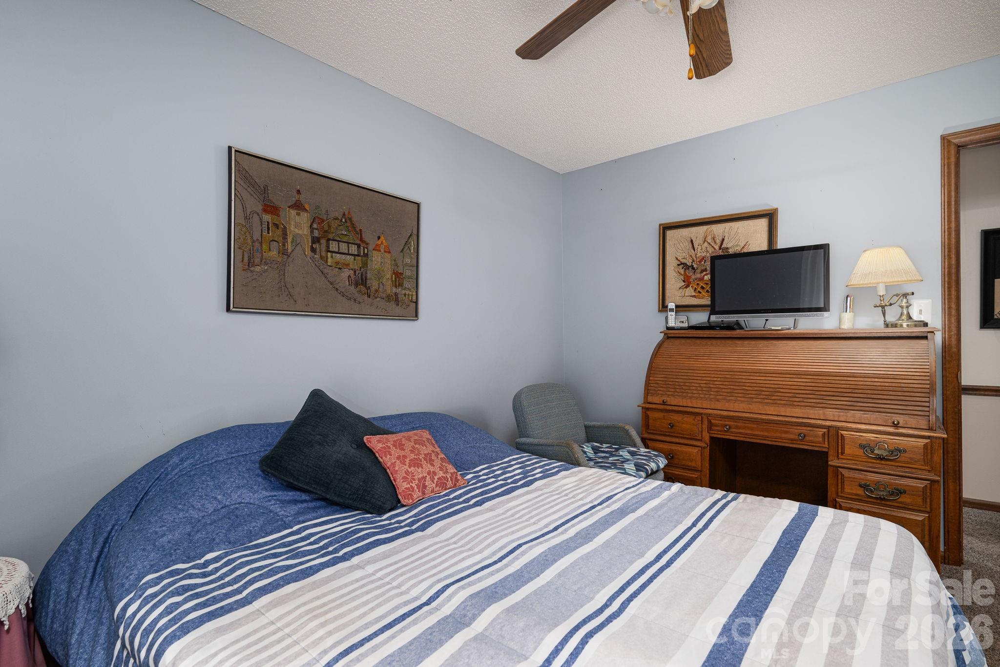 3815 Wildcherry Road Shelby, NC 28150 - Photo 19 of 33 a bedroom with a bed and a television