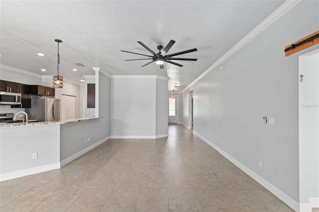 4765 Southeast 25th Street Ocala, FL 34480 - Photo 12 of 65 a view of an empty room and kitchen view