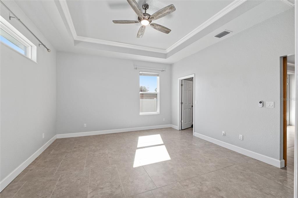 4765 Southeast 25th Street Ocala, FL 34480 - Photo 31 of 65 wooden floor in an empty room with a window