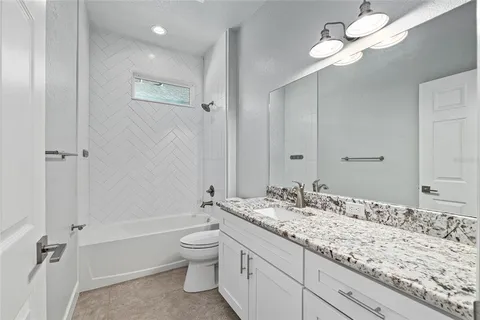 a view of a backyard of the house