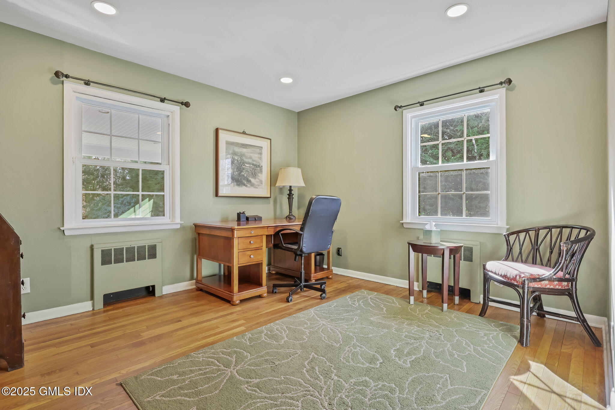 35 Indian Field Road Greenwich, CT 06830 - Photo 18 of 38 a view of a workspace with furniture and a window