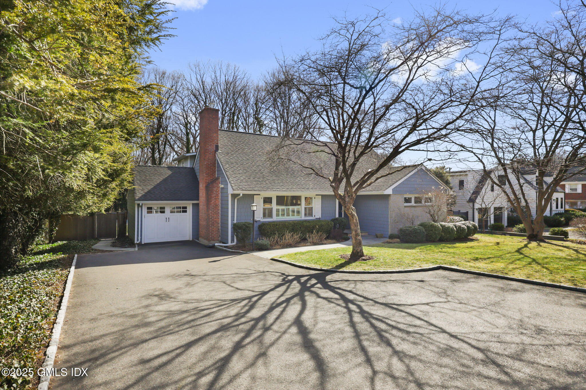 35 Indian Field Road Greenwich, CT 06830 - Photo 2 of 38 a view of a house with snow in front of it