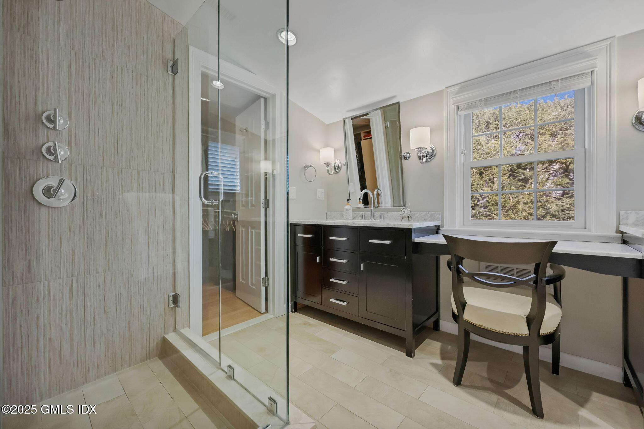 35 Indian Field Road Greenwich, CT 06830 - Photo 22 of 38 a room with a table chairs and a walk in closet