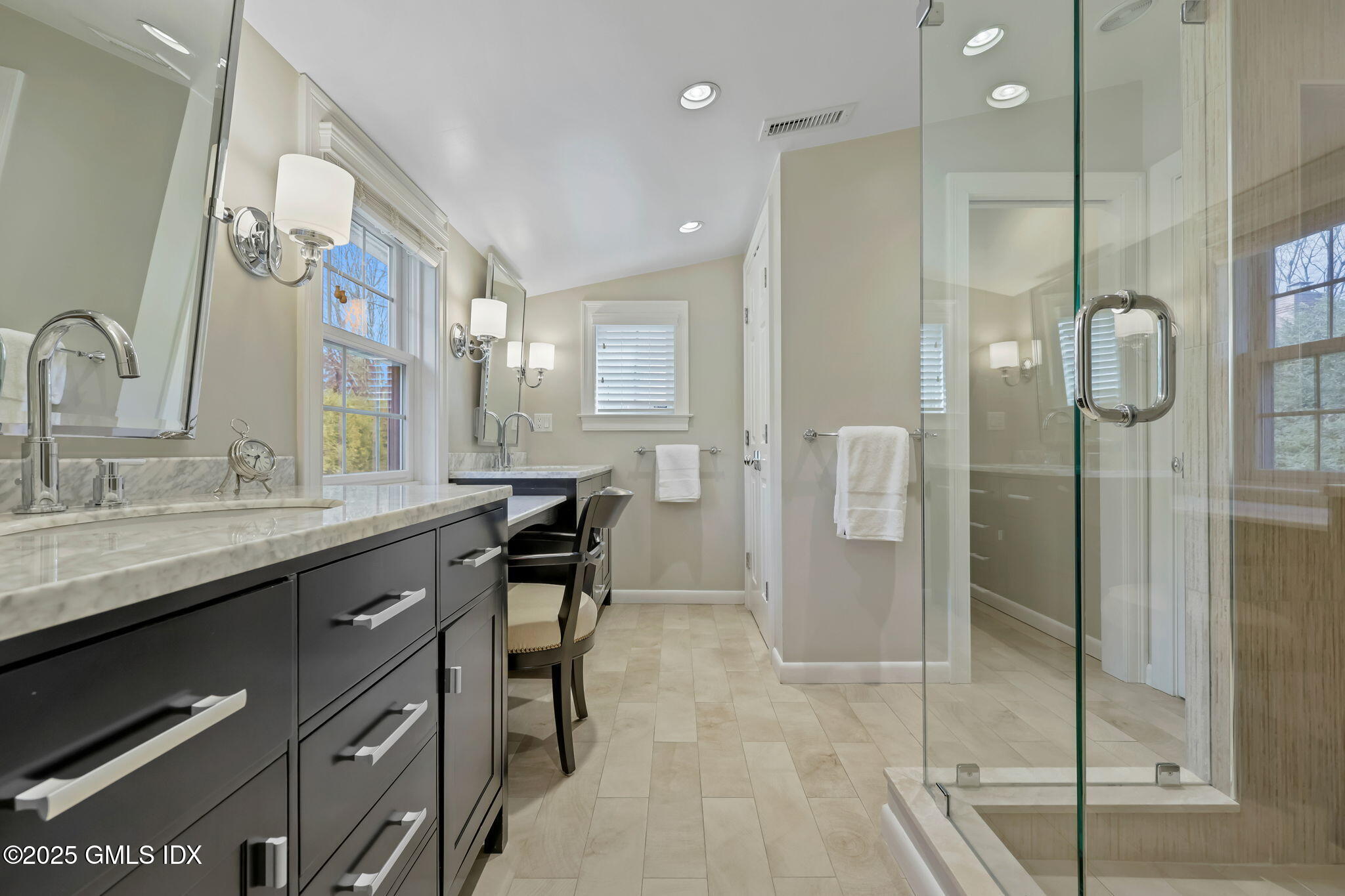 35 Indian Field Road Greenwich, CT 06830 - Photo 23 of 38 a bathroom with a granite countertop sink a toilet and shower