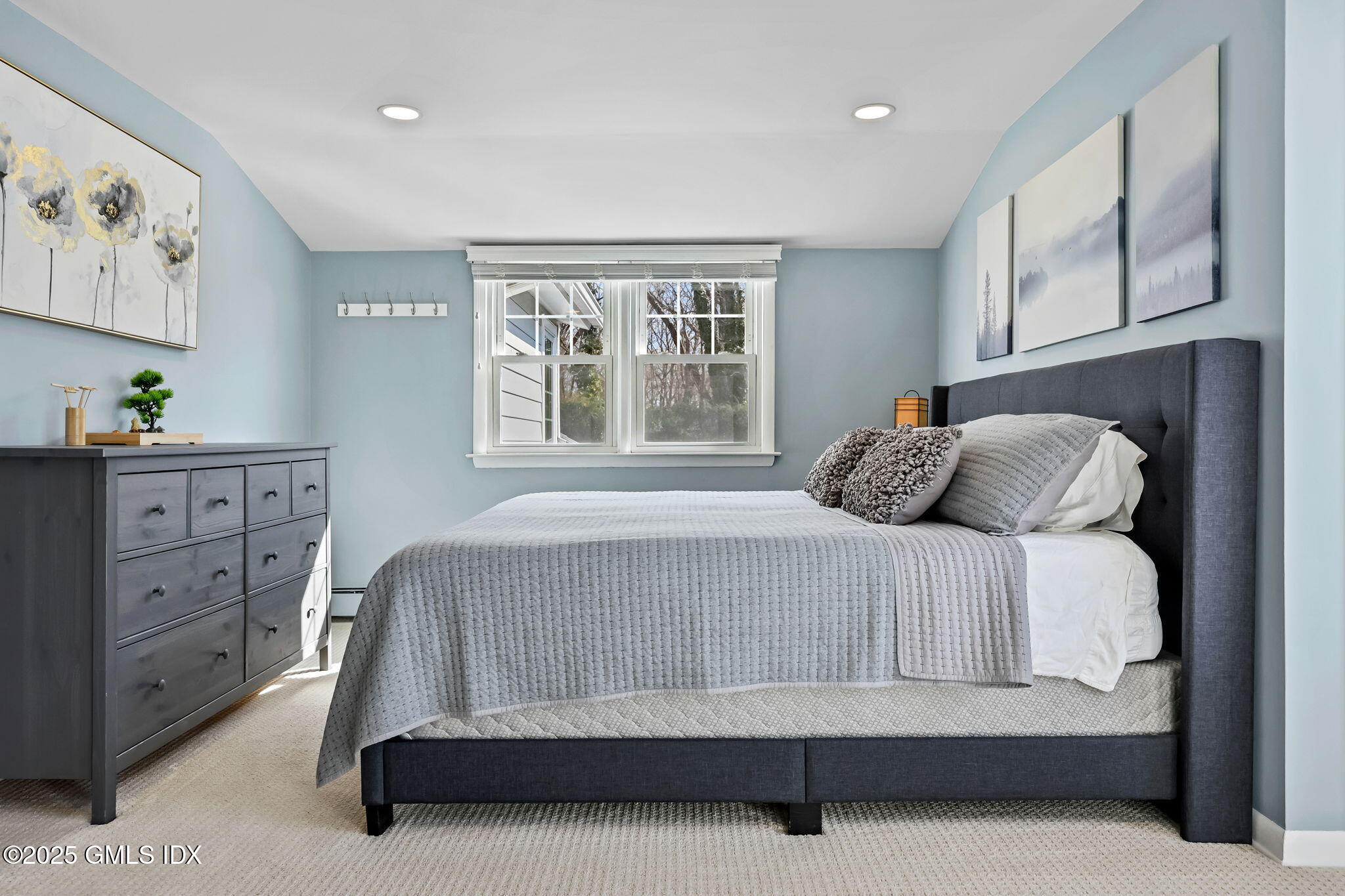 35 Indian Field Road Greenwich, CT 06830 - Photo 28 of 38 a bedroom with a bed and a window