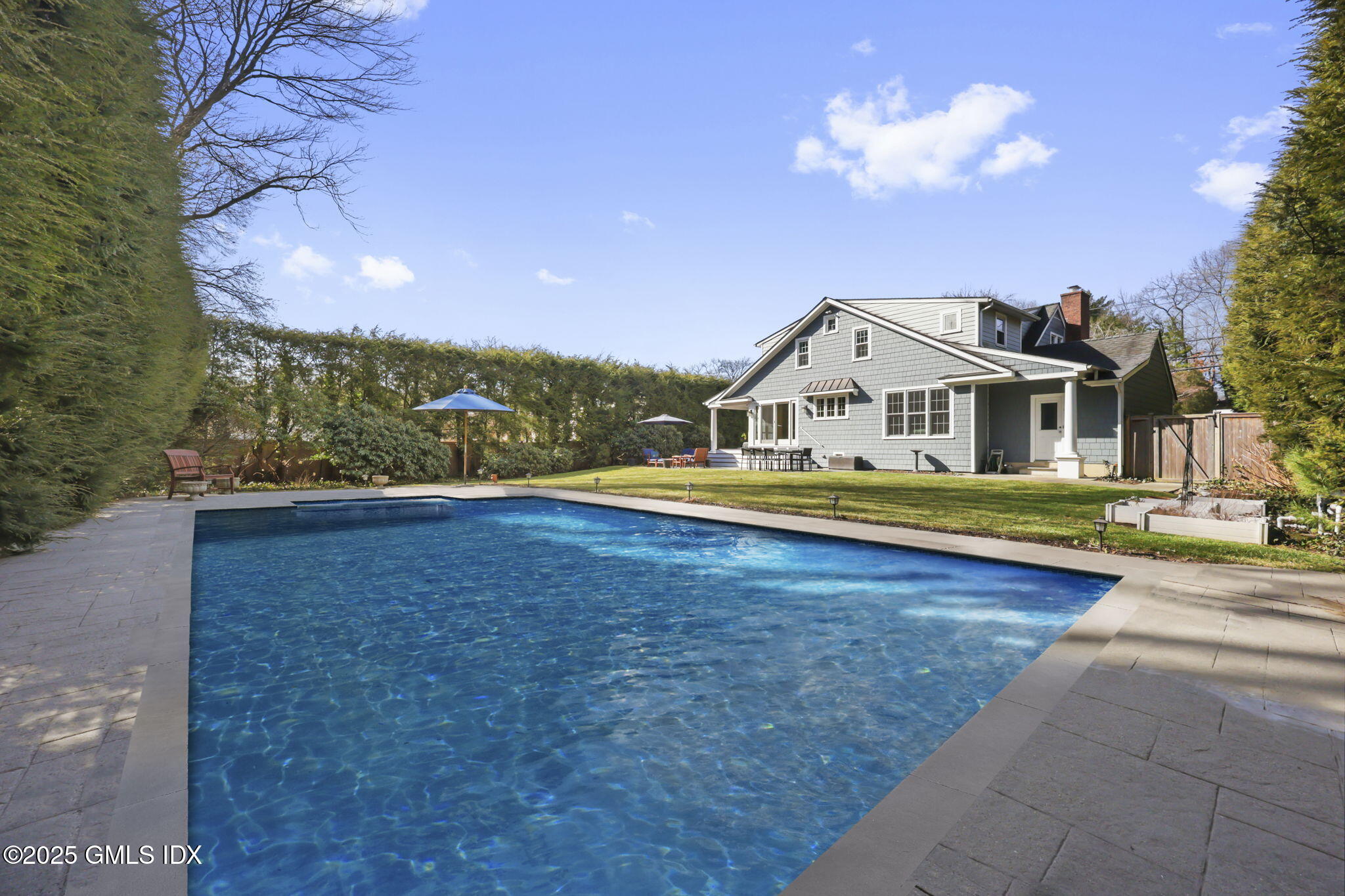 35 Indian Field Road Greenwich, CT 06830 - Photo 33 of 38 a view of house with yard and entertaining space