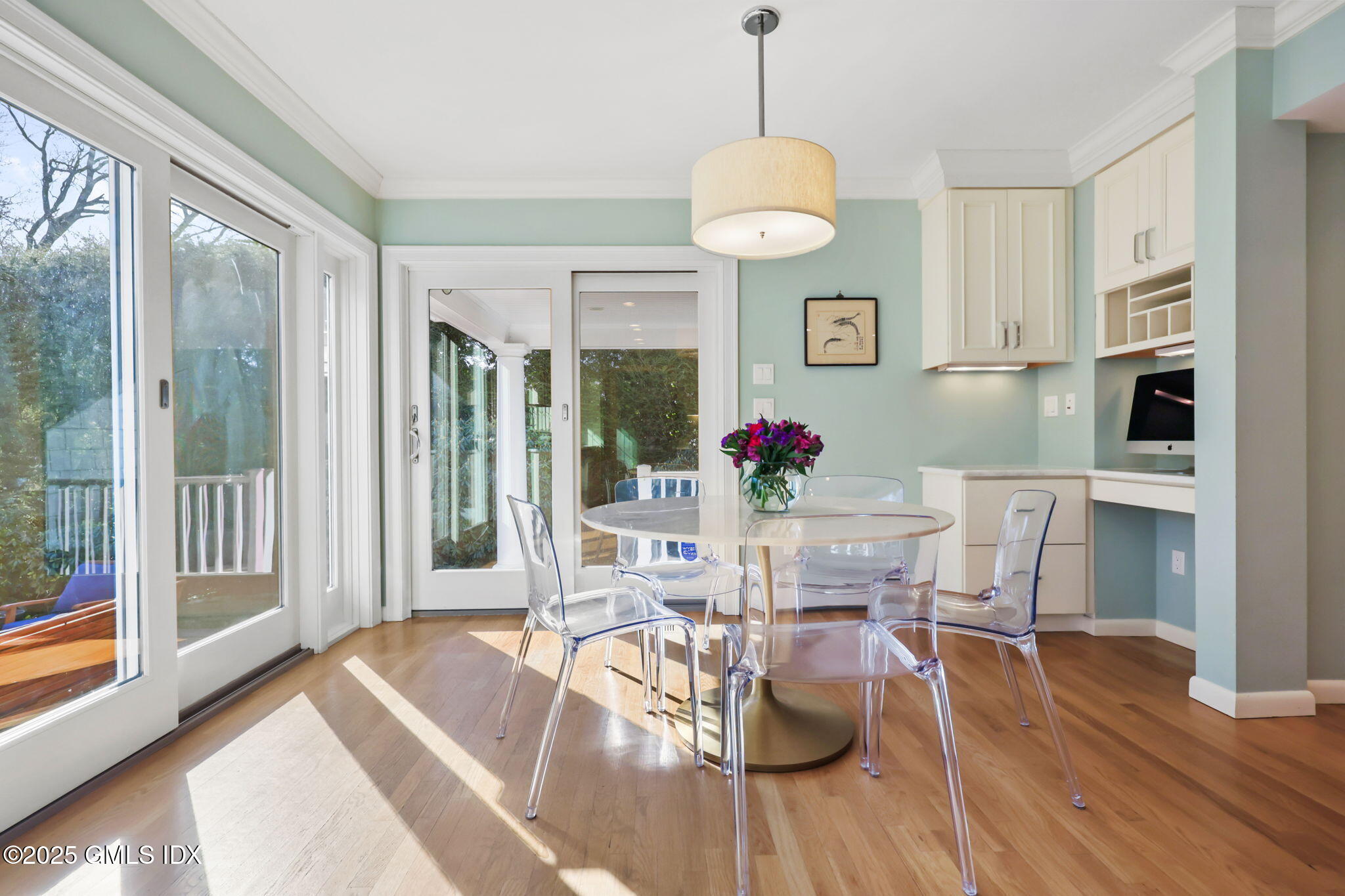 35 Indian Field Road Greenwich, CT 06830 - Photo 10 of 38 a view of a dining room with furniture window and wooden floor