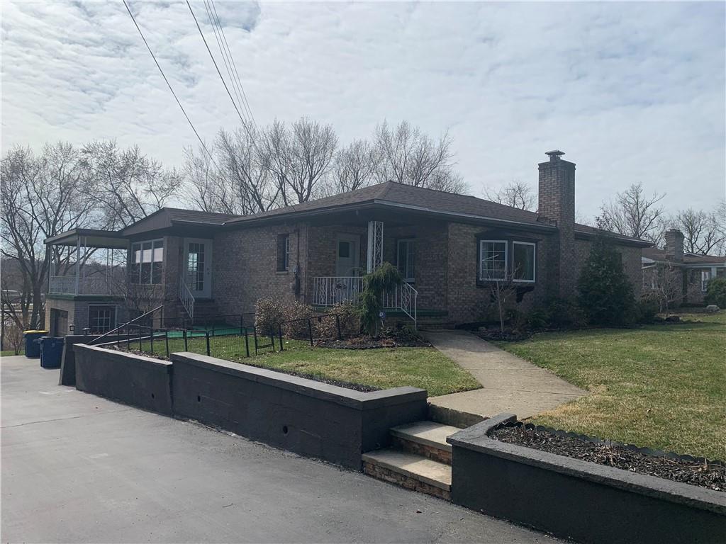 2404 Old Butler Road New Castle, PA 16101 - Photo 1 of 17 a view of backyard with seating space