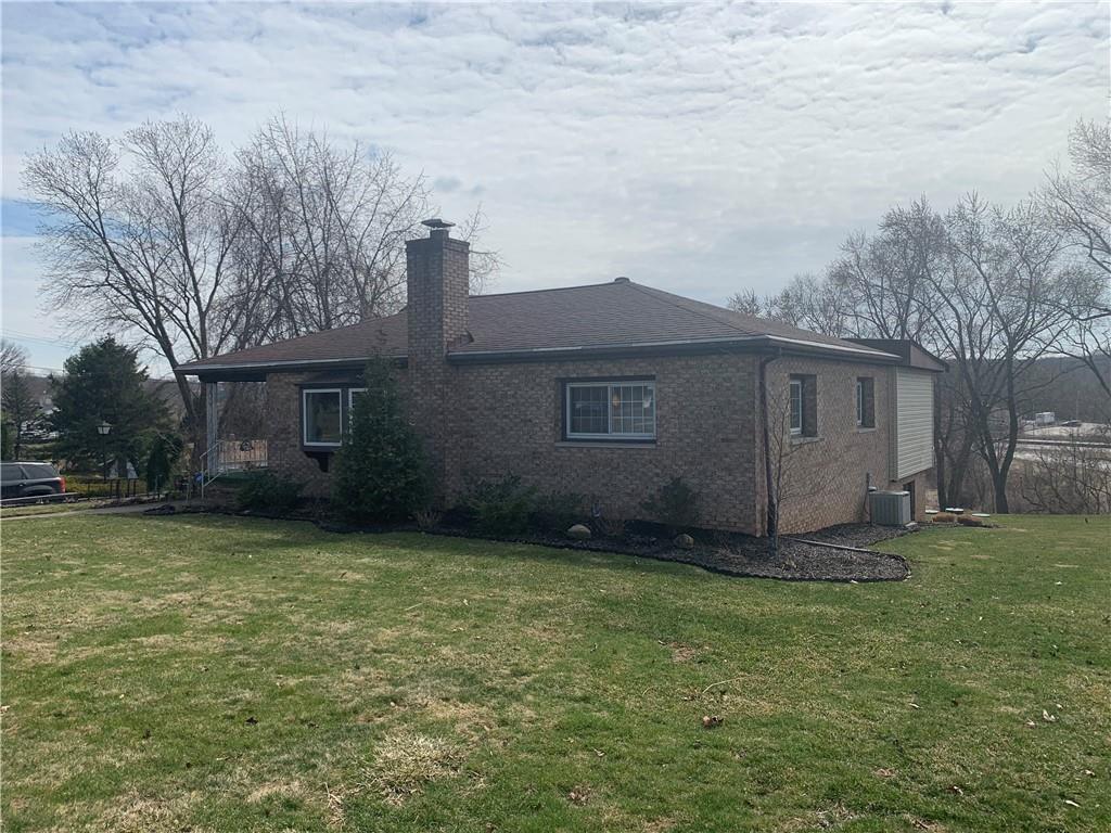 2404 Old Butler Road New Castle, PA 16101 - Photo 2 of 17 a view of a house with a yard