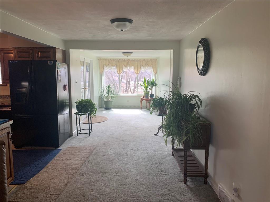 2404 Old Butler Road New Castle, PA 16101 - Photo 7 of 17 a entryway with furniture and a potted plant