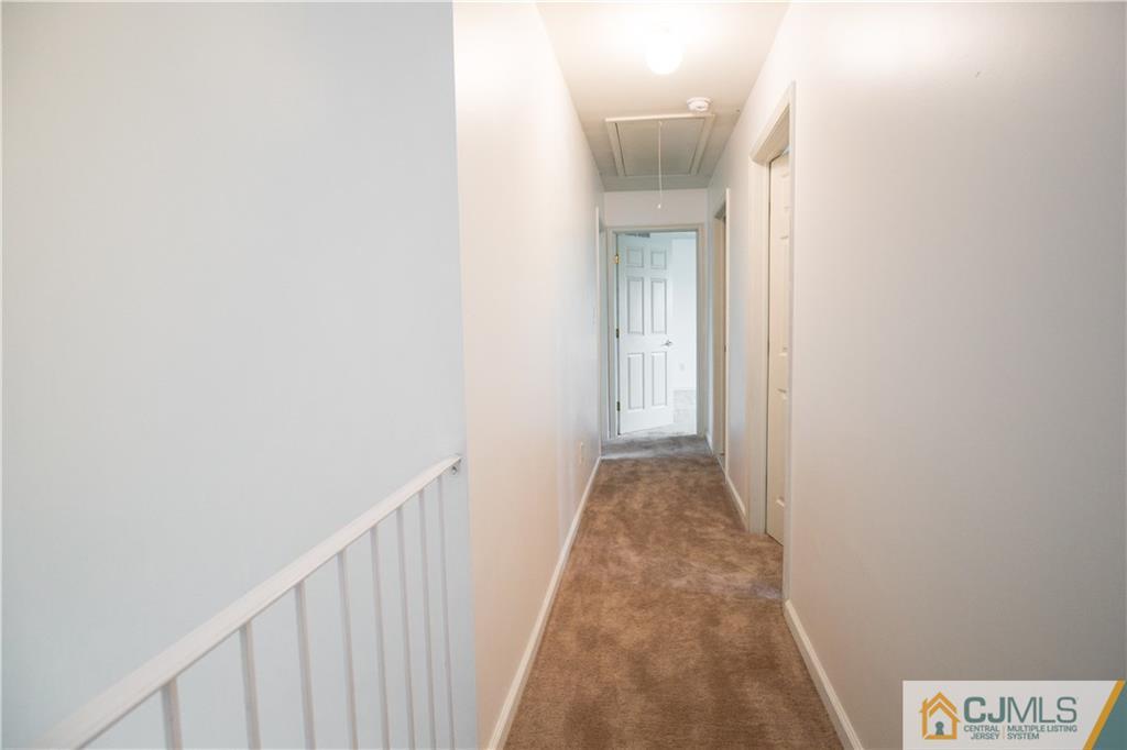 987 Cox Road North Brunswick, NJ 08902 - Photo 13 of 25 a view of a hallway