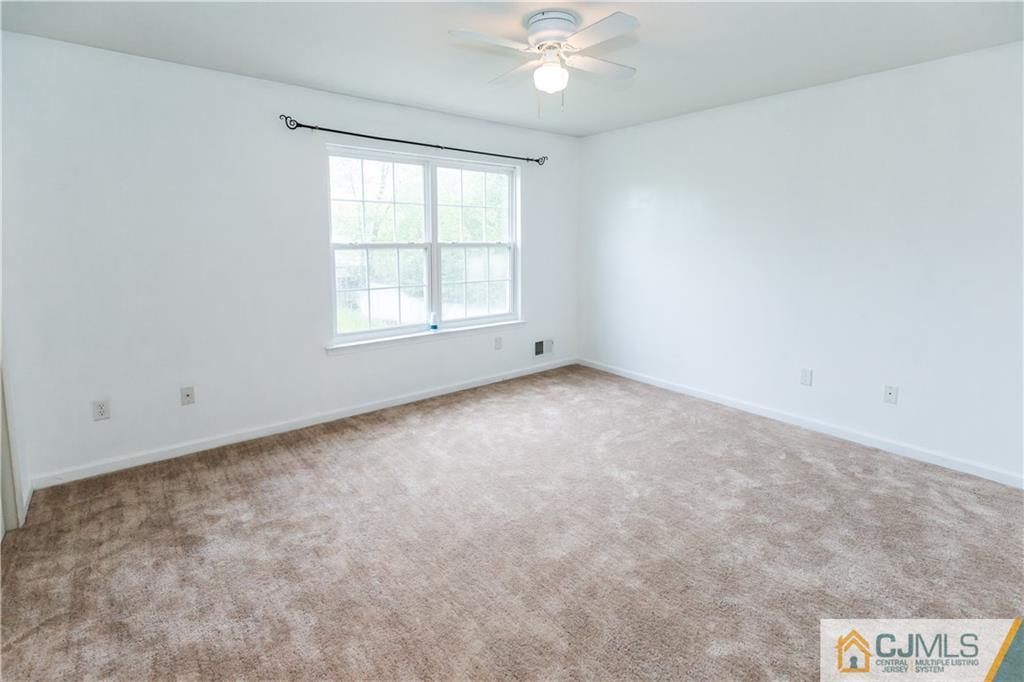 987 Cox Road North Brunswick, NJ 08902 - Photo 15 of 25 an empty room with a window