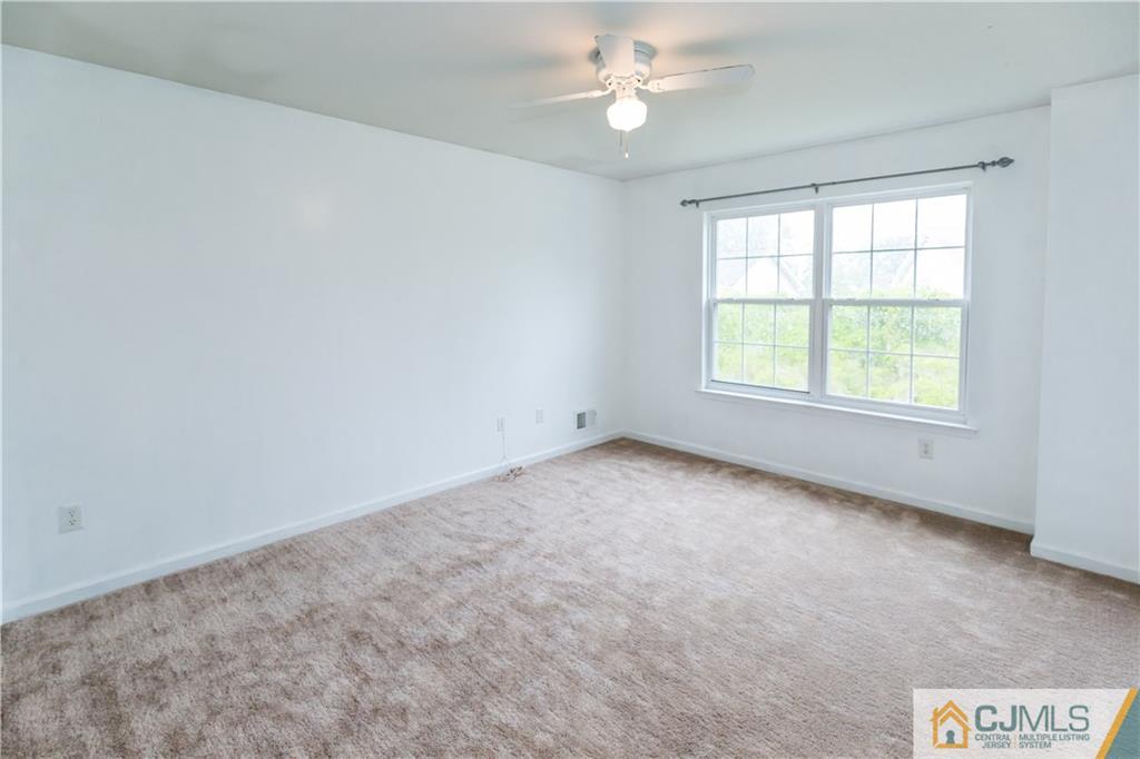 987 Cox Road North Brunswick, NJ 08902 - Photo 16 of 25 an empty room with a window