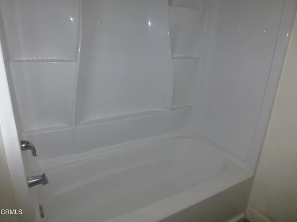 a close view of a bathtub in bathroom