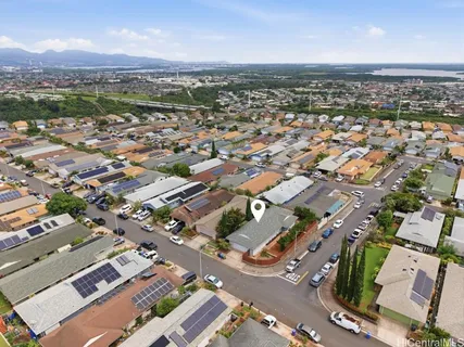an aerial view of a city with lots of residential buildings