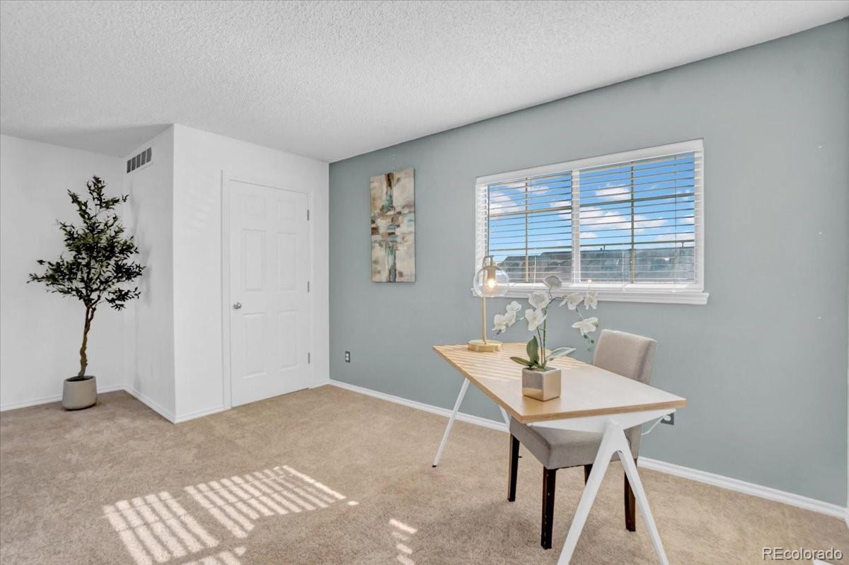 3066 West Prentice Avenue, Unit G Littleton, CO 80123 - Photo 12 of 18 a workspace with furniture and window