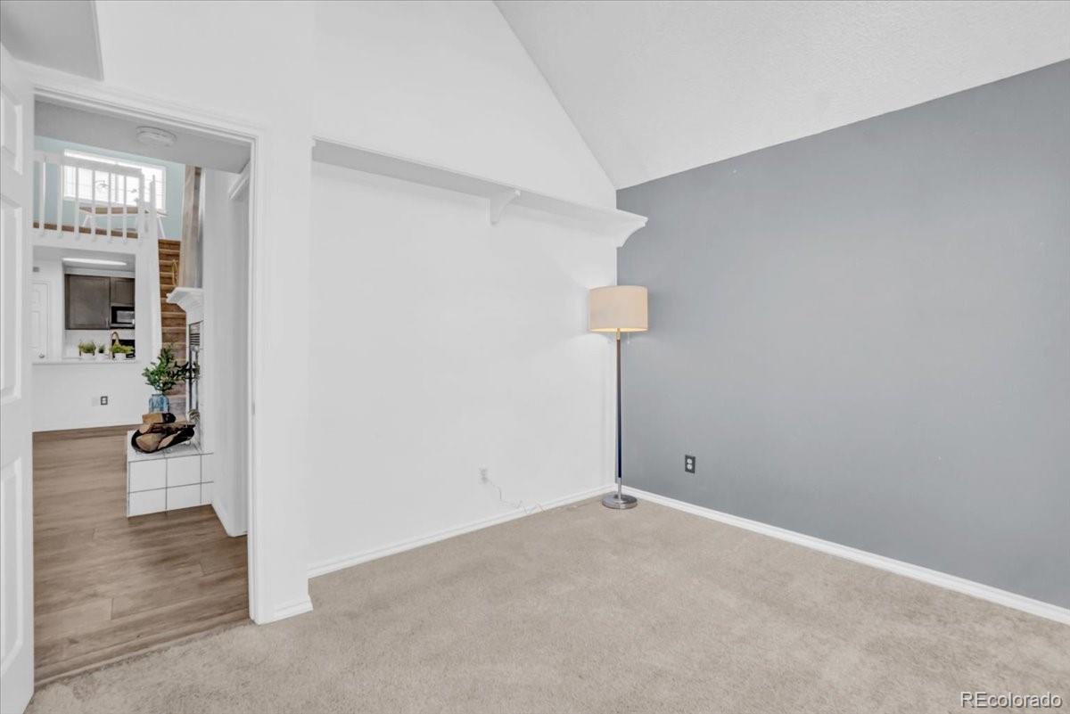 3066 West Prentice Avenue, Unit G Littleton, CO 80123 - Photo 14 of 18 wooden floor in an empty room