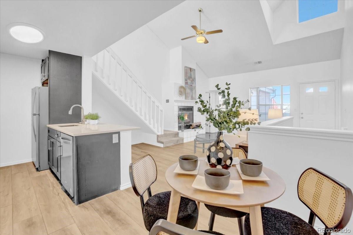 3066 West Prentice Avenue, Unit G Littleton, CO 80123 - Photo 6 of 18 a view of kitchen with furniture and wooden floor