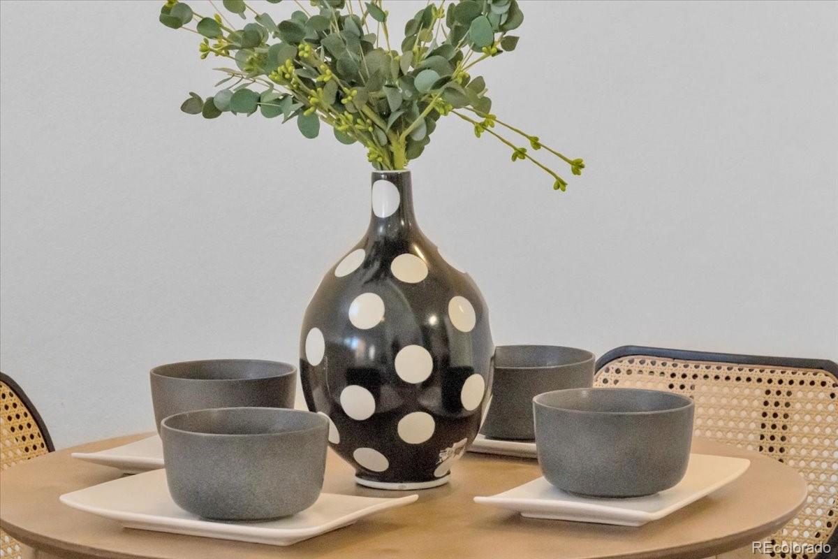 3066 West Prentice Avenue, Unit G Littleton, CO 80123 - Photo 8 of 18 a vase of flowers sitting on a table