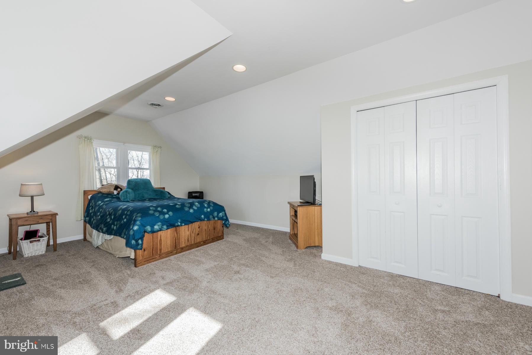 15103 Parrish Road Upperco, MD 21155 - Photo 17 of 26 a bedroom with a bed and a window