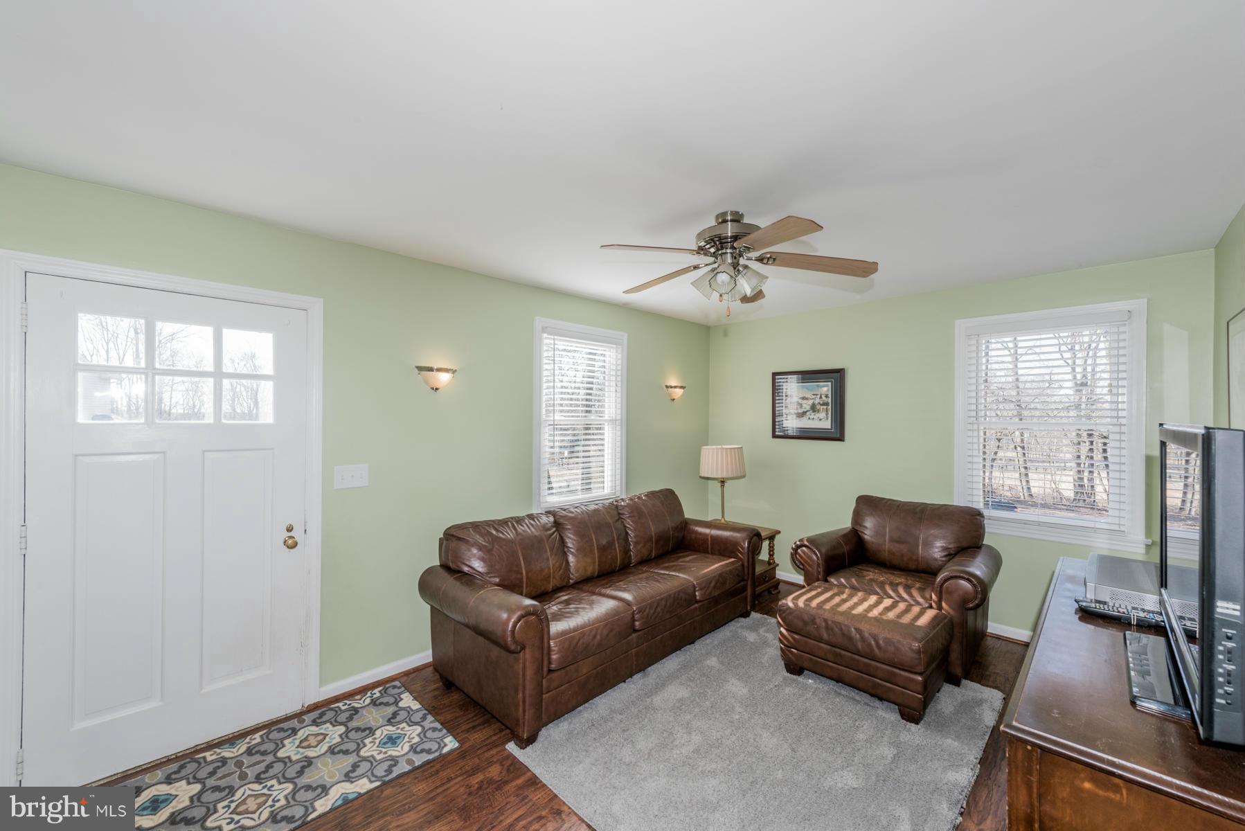 15103 Parrish Road Upperco, MD 21155 - Photo 3 of 26 a living room with furniture and a window