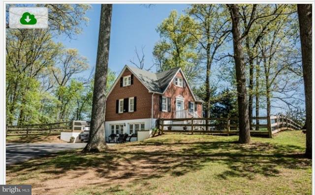 15103 Parrish Road Upperco, MD 21155 - Photo 23 of 26 a view of a house with a yard