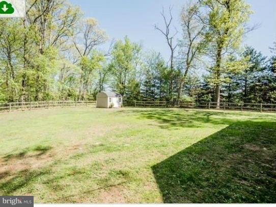 15103 Parrish Road Upperco, MD 21155 - Photo 25 of 26 a swimming pool that has lawn chairs and a big yard