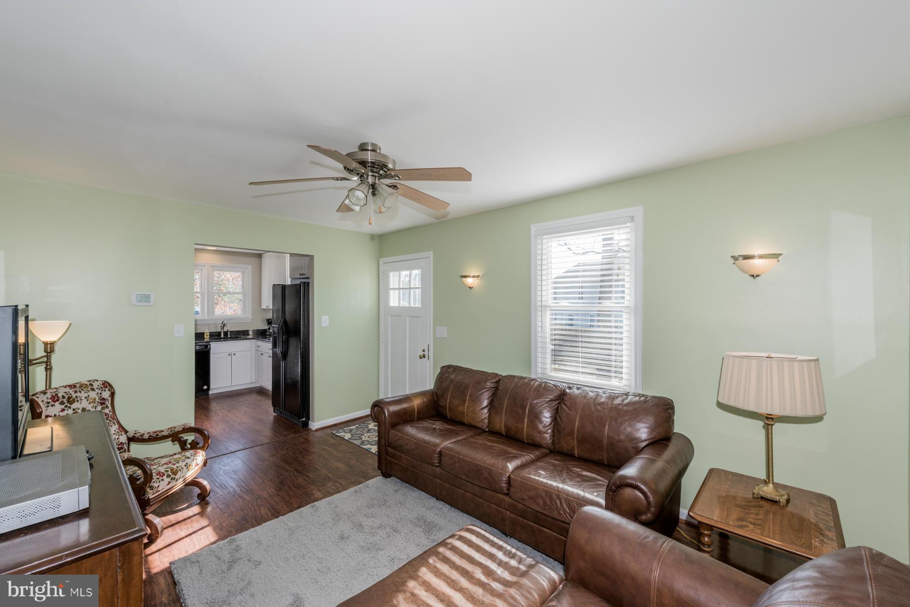 15103 Parrish Road Upperco, MD 21155 - Photo 4 of 26 a living room with furniture and a window